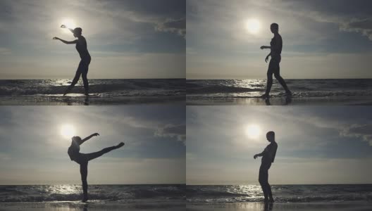年轻女子在休闲风格-牛仔和黑色上衣在海滩上做芭蕾。迷人的芭蕾舞演员在秋天的沙滩上练习伸展。慢动作高清在线视频素材下载