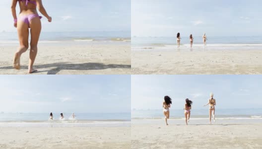 女孩在水里跑步后视镜，年轻女人在海滩上小组高清在线视频素材下载