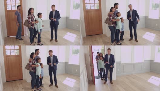 房地产经纪人展示家庭周围的新家园拍摄的R3D高清在线视频素材下载