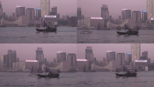 特写香港水月船通过前九龙城景观在晚上高清在线视频素材下载