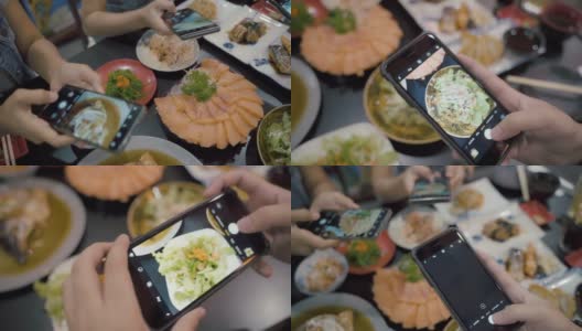 亚洲女性用智能手机拍下日本美食，在社交媒体上分享乐趣和幸福。高清在线视频素材下载