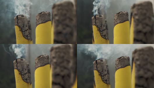 巨大的黄色烟熏祭香慢镜头高清在线视频素材下载