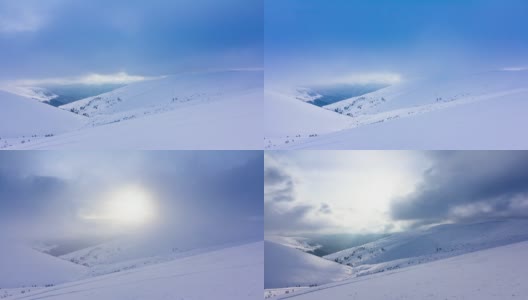 冰雪覆盖的树木构成了美丽的冬季景观。冬天的山。高清在线视频素材下载