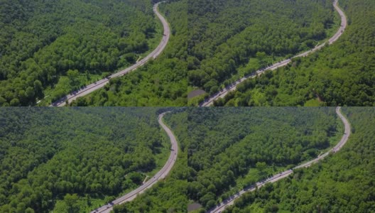 沿着乡村公路在田野上空飞行。在蓝天和白云的背景下。泰国高清在线视频素材下载