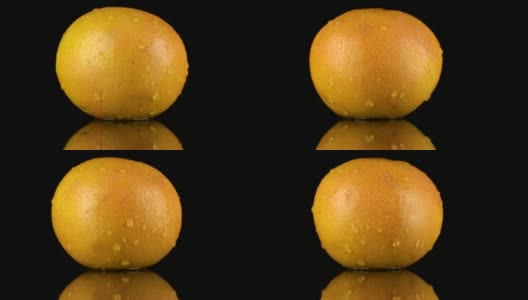 橙子葡萄柚的露珠是绕轴旋转的高清在线视频素材下载