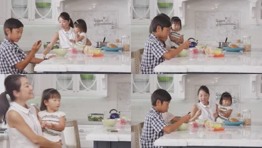 忙碌的母亲组织儿童在R3D早餐拍摄高清在线视频素材下载