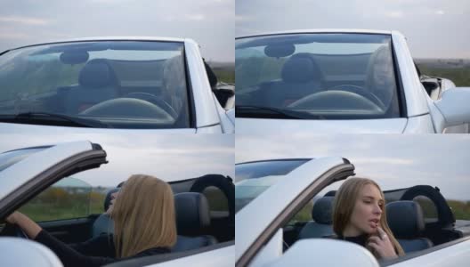 坐在车里的年轻女子高清在线视频素材下载