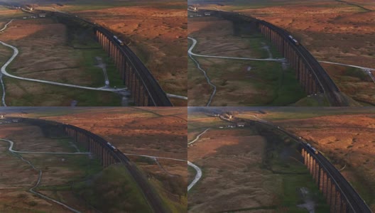 日落时分，火车穿过里布尔海德高架桥——无人机拍摄高清在线视频素材下载