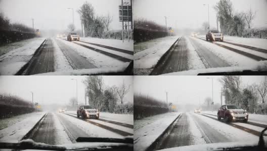 在英国的雪地上驾驶汽车高清在线视频素材下载