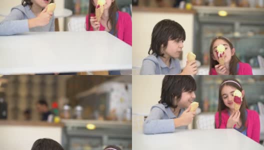 哥哥和姐姐在冰淇淋店享受着冰淇淋，看起来很开心，谈笑风生高清在线视频素材下载