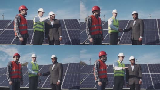太阳能电池板工人和经理在外面高清在线视频素材下载