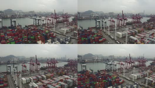 由起重机运往香港维多利亚港。鸟瞰图无人机4k视频。高清在线视频素材下载