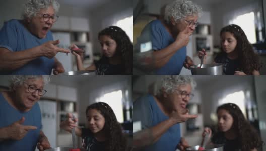 奶奶在家里和孙女一起做巧克力高清在线视频素材下载