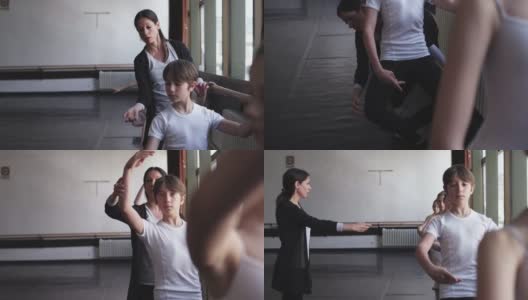 女芭蕾舞老师帮助小芭蕾舞演员舞蹈元素高清在线视频素材下载