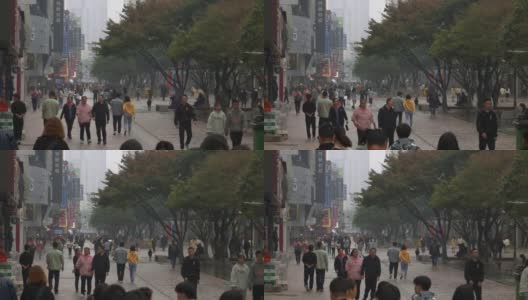 雨天长沙市著名的行人旅游拥挤街道慢镜头全景4k中国高清在线视频素材下载