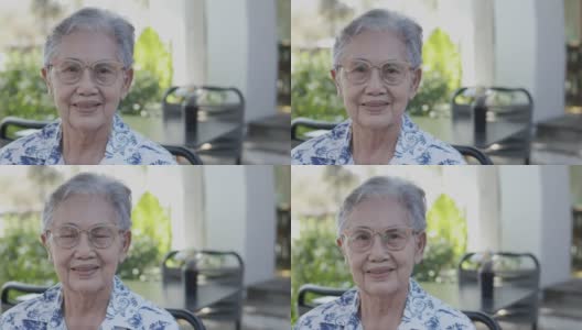 近4K户外亚洲老年女性(80岁女士)美丽的灰色头发，皱纹皮肤和自然的笑脸，表达了对退休生活的情绪积极和快乐。高清在线视频素材下载