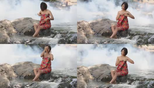 亚洲女人在泰国瀑布洗澡高清在线视频素材下载