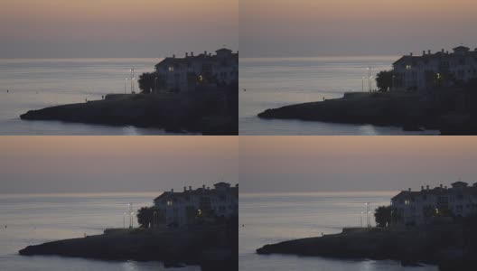 日落时分，海岸附近的豪华住宅高清在线视频素材下载