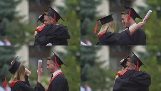 男女朋友拥抱，手里拿着高等学历证书高清在线视频素材下载