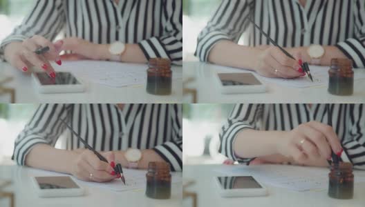 女性手持书法笔，在网上观看范例高清在线视频素材下载