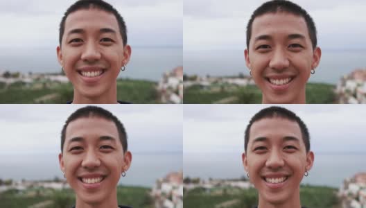 年轻的亚洲男孩在镜头前微笑高清在线视频素材下载