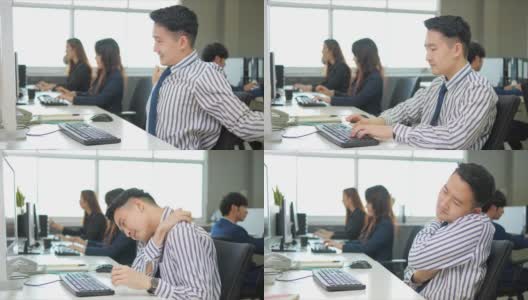 上班族因为长时间坐着工作而患上了“办公室综合症”，因此会出现严重的背痛高清在线视频素材下载