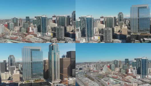 无人机拍摄飞行和平移在西雅图市中心的城市景观，华盛顿与建筑物，滨水，太空针，蓝天和高速公路在视野。高清在线视频素材下载