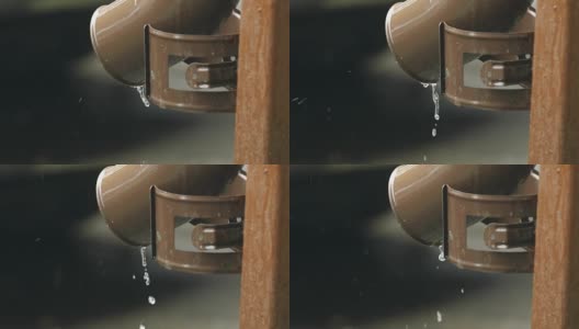 雨水从排水管流出的特写高清在线视频素材下载