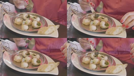 在餐馆吃蜗牛，4K高清在线视频素材下载