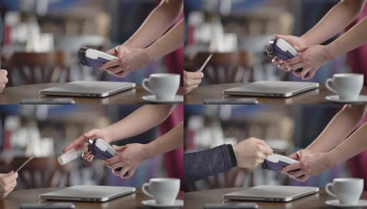 在咖啡厅使用信用卡终端。特写，男性的手拿着信用卡。无联系方式付款高清在线视频素材下载