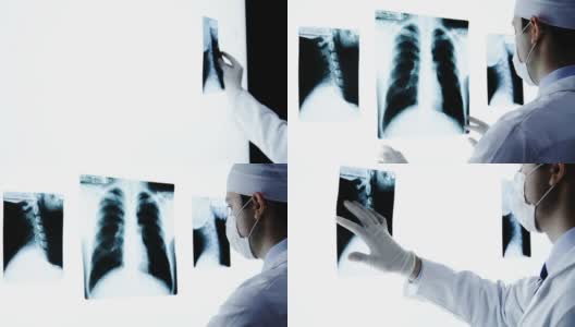 年轻医生在放射科做X光检查高清在线视频素材下载