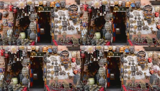 尼泊尔加德满都出售传统的彩色手工木制面具和手工艺品。在巴德岗的杜巴和帕坦的纪念品商店。斯瓦扬布纳特亚洲装饰市场高清在线视频素材下载