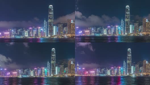 时间推移夜光维多利亚湾和建筑物基础设施在香港的中心-维多利亚港与现代化的商业大厦外的地区城市高清在线视频素材下载