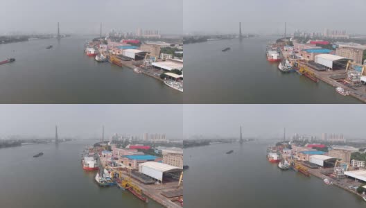拖船和货船停泊在一个小型货港。高清在线视频素材下载