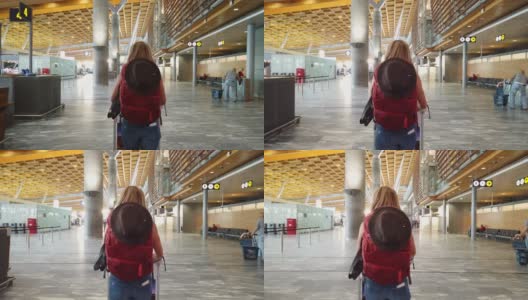 一名女子在机场行走的视频。高清在线视频素材下载