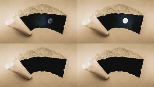 创造性的4k时间循环播放了一个在夜空中发光的满月和漂浮的云的视频，这是通过一个带有撕裂边缘的旧复古旧纸洞可以看到的。高清在线视频素材下载
