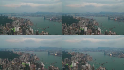 日落黄昏香港城市景观湾仔区维多利亚港码头空中全景4k高清在线视频素材下载