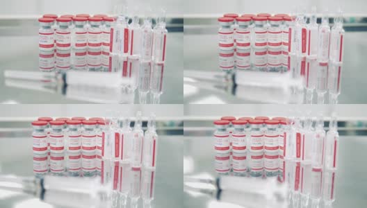 医用台装有安瓿covid-19疫苗高清在线视频素材下载