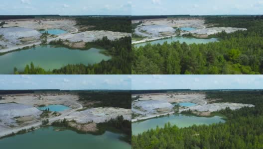 采石场湖在废弃的高岭土坑之间的森林，鸟瞰高清在线视频素材下载