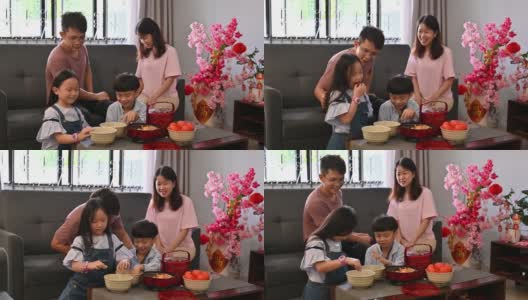 快乐的中国家庭在家里庆祝中国新年高清在线视频素材下载
