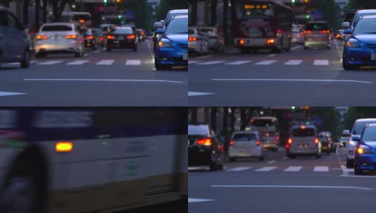 傍晚的车辆在红绿灯处停下来转弯高清在线视频素材下载