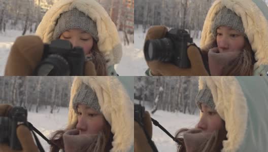 美丽的年轻女子在冬天的衣服，手套和羊毛帽子拍摄雪山森林针织相机高清在线视频素材下载