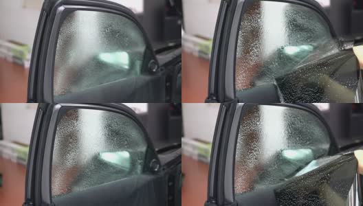 为汽车玻璃安装着色膜高清在线视频素材下载