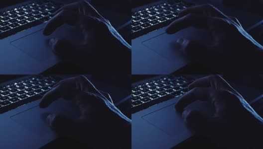 一只手在晚上用笔记本电脑工作高清在线视频素材下载