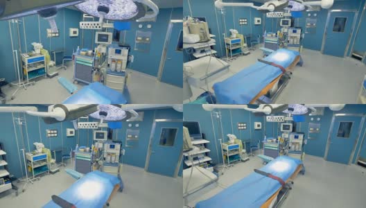 一个空的和未使用的手术台，在医疗灯下靠近工作设备。4 k。高清在线视频素材下载