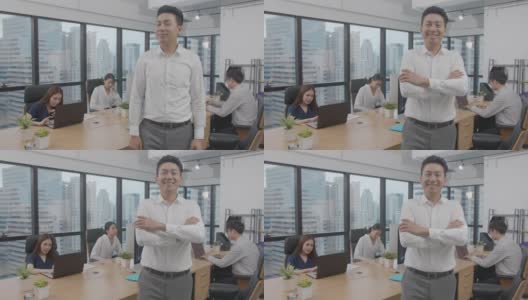 4K分辨率亚洲商务人士站在商务团队的室内现代办公室，亚洲商务办公生活方式高清在线视频素材下载