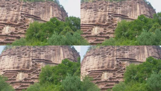 中国甘肃省天水市麦积山石窟庙群丝绸之路上一座有宗教洞穴的山高清在线视频素材下载