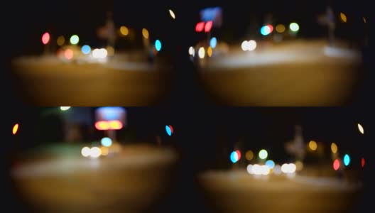 城市和车灯。C-mount镜头圆形散焦模糊散焦镜头。高清在线视频素材下载