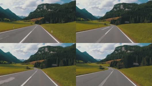 奥地利，骑摩托车的人在风景优美的山路上。第一人称视角高清在线视频素材下载
