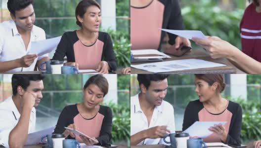 4K Medium拍摄的是年轻的成年亚洲商人和自由职业女商人在户外咖啡店一起使用数字平板电脑讨论业务。团队合作年轻的商人和女商人一起工作。高清在线视频素材下载